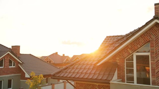 Close up panorama shot of brown roof of modern house during the sunshine.