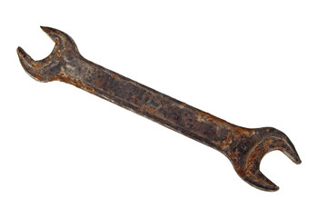 Old rusty wrench on white background