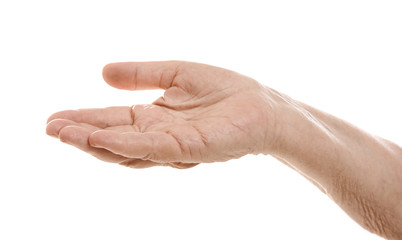 Senior woman's hand on white background