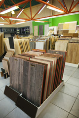 Obraz na płótnie Canvas Assortment of laminated flooring samples in hardware store