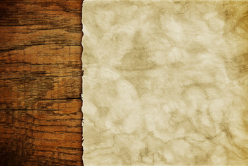Grunge paper sheet on wooden wall or table in loft style
