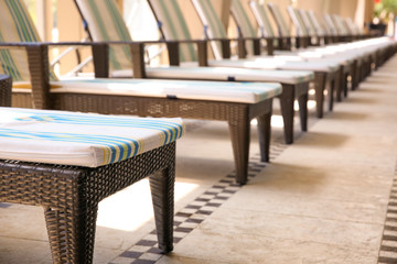 Comfortable chaise longues at resort