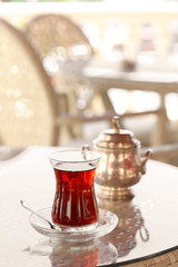 Turkish tea in traditional glass on table