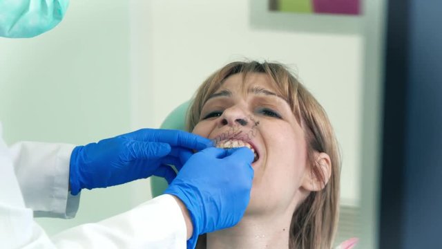 Dentist takes a measure of teeth
