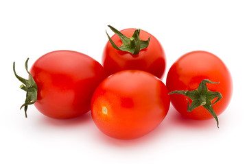 Small plum tomatoes on a white background.