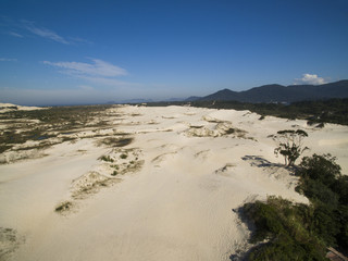Aerial view Dunes in sunny day - Joaquina beach - Florianopolis - Santa Catarina - Brazil. July, 2017