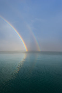 double rainbow over the ocean