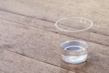 water in plastic glass