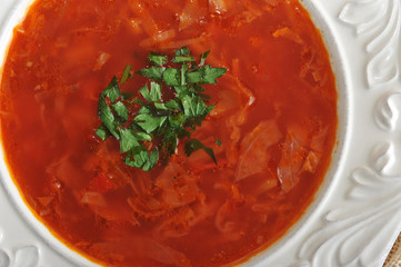 soup with beets and cabbage and green parsley