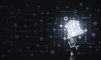 Conceptual image with hand pointing at house or main page icon o