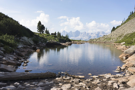 Lake Spiegelsee with mountain Dachstein on Reiteralm, austria