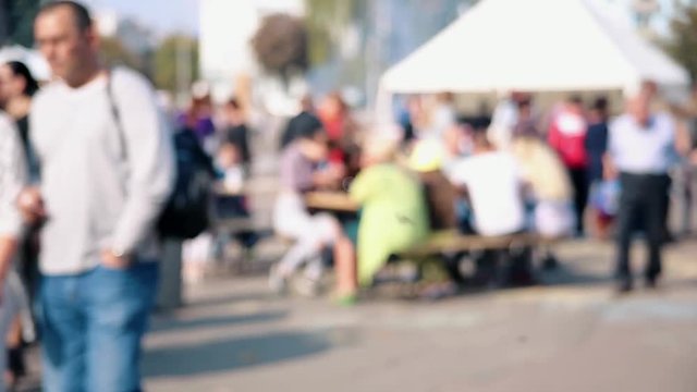 ZHITOMIR, UKRAINE- September 15, 2017: Urban holiday, Shopping in the city, festive trade. Urban people in city crowd at the street, trade at the fair. Festive shopping