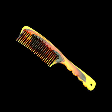 One comb isolated on black background