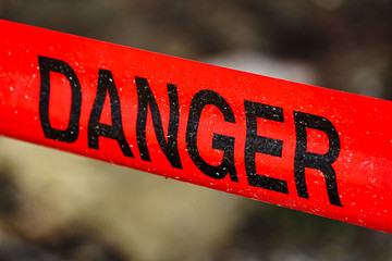 Closeup of red danger tape