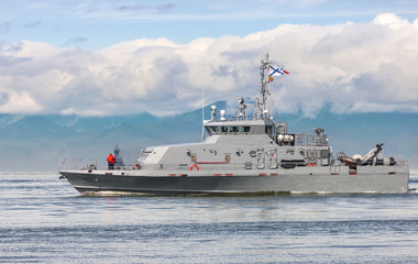 Russian warship going along the coast © bborriss