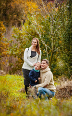 Fototapeta premium portrait Happy family in forest