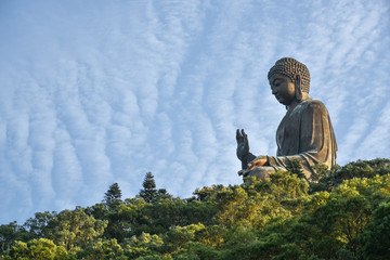 Giant Buddha Po Lin Monastery on the mountain at Lantau Island in Hong Kong with blue sky