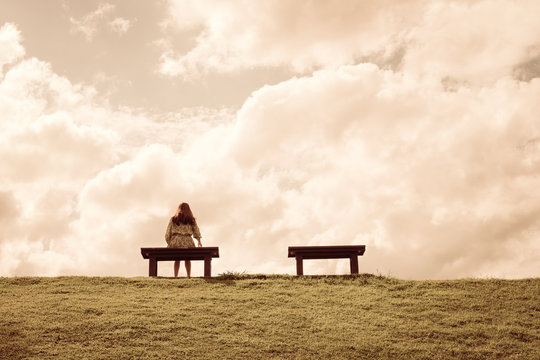 A Women Sitting Alone On A Bench Waiting For Love, Alone Concept