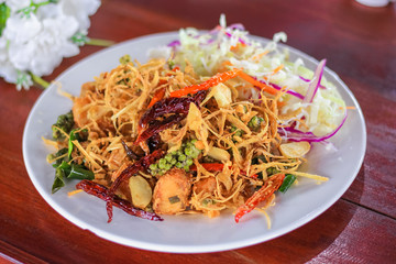 Deep fried snapper with herbs and chili