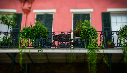 Balcony and wrought iron grating. Traditional architecture of old New Orleans. Cozy summer house