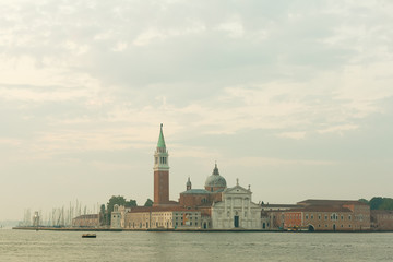 Fototapeta premium Sunrise in San Marco square, Venice, Italy. Venice Grand Canal. Architecture and landmarks of Venice. Venice postcard with Venice gondolas