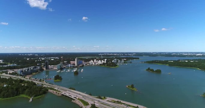 Keilaniemi, Cinema 4k 360 degree aerial view of kagelviken, westend, laajalahti, keilalahti and the baltic sea, just outside helsinki, at a sunny day, in Espoo, Uusimaa, Finland
