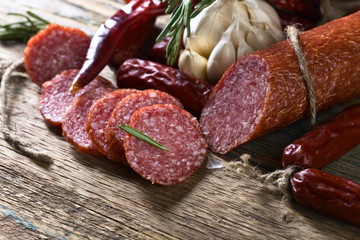 Sausages with rosemary , garlic and pepper.