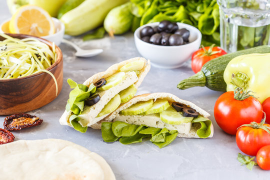 Healthy sandwiches with vegetables and tofu in pita.