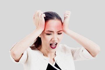 Woman headache and holding head on gray background