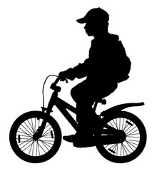 Fototapeta na wymiar Child on a bicycle silhouette