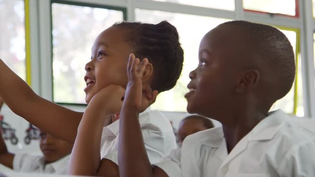 School kids counting out loud in an elementary school class