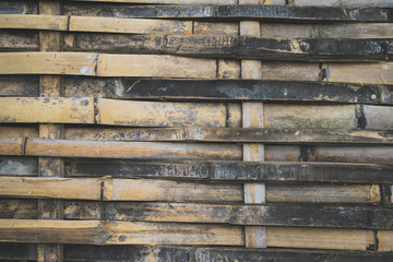 Full Frame Shot Of Weathered Bamboo Fence.