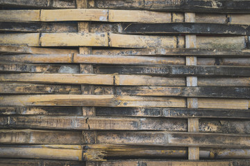 Full Frame Shot Of Weathered Bamboo Fence.