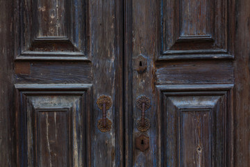 Fototapeta na wymiar Old wooden brown house door