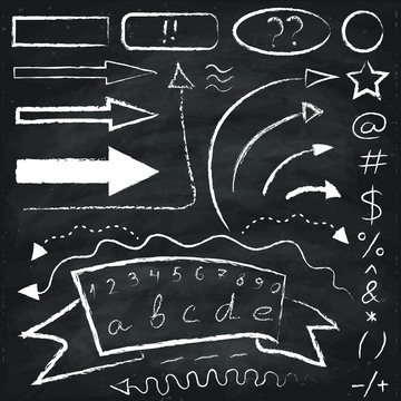 Set of chalk drawn  arrows and symbols on the chalkboard background.