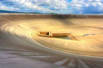 Empty upper dam of the pumping hydroelectric power plant in the Czech Republic