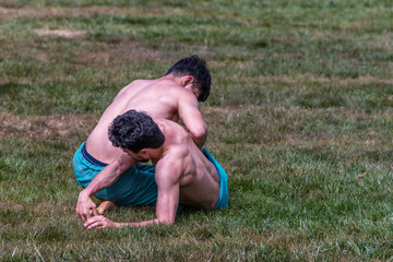 Unidentified shalwar(shalvar) gurescileri (kuroshio/wrestlers). Shalwar wrestling is a kind of traditional Turkish wrestling which is popular in Turkey. ISTANBUL,TURKEY,May 13,2017