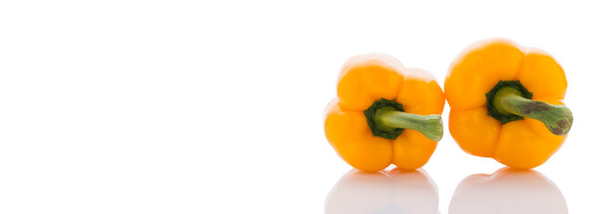 Ripe yellow bell peppers. Isolated on white
