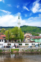 View of the architecture and embankment of the Milyacki River in the historical center of Sarajevo,...