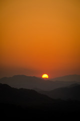 Obraz premium Mount Phou Si temple sunset