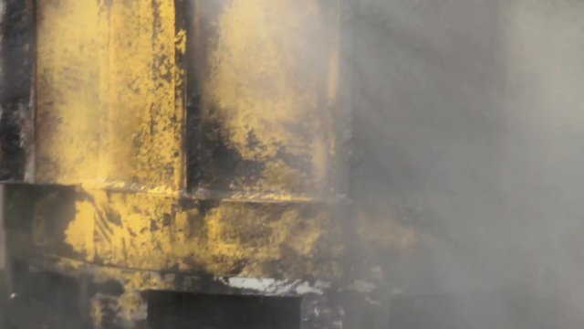 High Pressure Washing In Factory. Worker Cleans Truck Engine. High Pressure Washing. Closeup