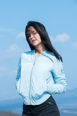 Fashion model on blue sky background.
