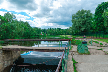 Obraz premium Water with foam. Abstraction for background. A small waterfall. Movement of water.