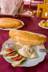 Vang Vieng, Laos - January 19, 2017: Typical backpackers breakfast in Vang Vieng village, Laos