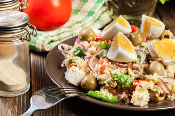 Fresh salad with couscous and eggs