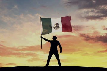 Male silhouette figure waving Mexico flag. 3D Rendering