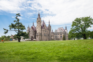 Obraz premium The Moszna Castle is a historic palace located in a small village in Moszna is one of the best known monuments in Upper Silesia.