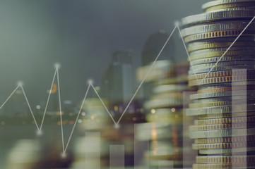 double exposure pile of coins and night city, concept in growth, save, finance, account,capital banking  and investment in business
