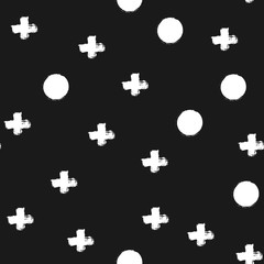 Fototapeta premium Repeated crosses and circles drawn with a brush. Seamless pattern. Grunge, graffiti, ink, sketch, watercolor. White shapes on a black background.