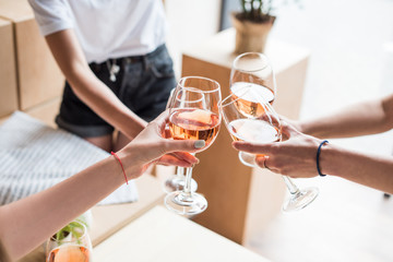 women clinking with wineglasses